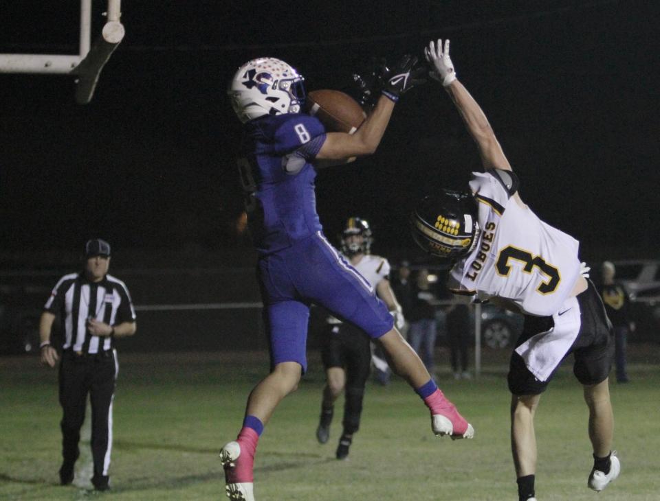 Coleman wideout Braxton Smith catches a two-point conversion in the fourth quarter of the Bluecats' 31-7 win over Cisco on Oct. 22. The Bluecats finished unbeaten.