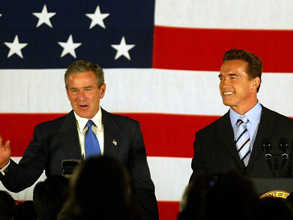 Arnold Schwarzenegger and former President George W. Bush in 2003.