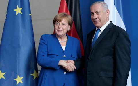 German Chancellor Merkel - Israeli PM Netanyahu joint press conference in Berlin - Credit: Anadolu