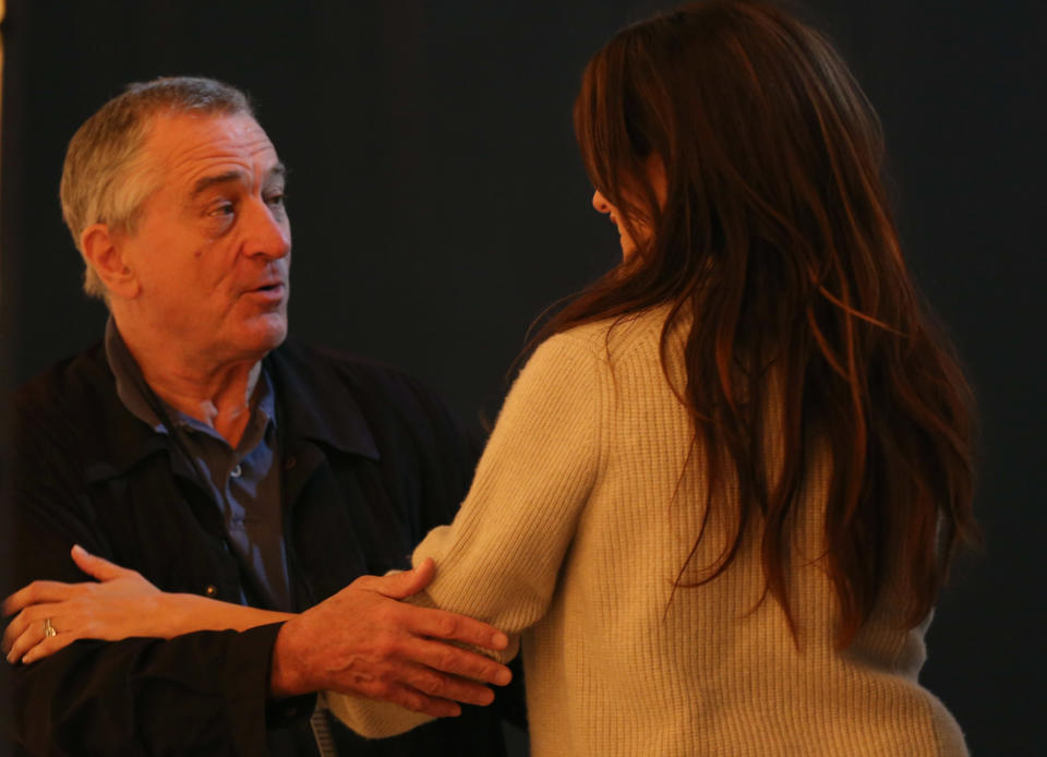 Penelope Cruz, right, and Robert DeNiro greet each other during rehearsals for the 86th Academy Awards in Los Angeles, Saturday, March 1, 2014. The Academy Awards will be held at the Dolby Theatre on Sunday, March 2. (Photo by Matt Sayles/Invision/AP)