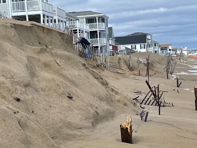 These 'sacrificial dunes' protected US homes from a strong winter storm.  Then they were washed away
