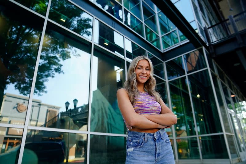 Katie Feeney poses for a portrait at a shopping center in Gaithersburg