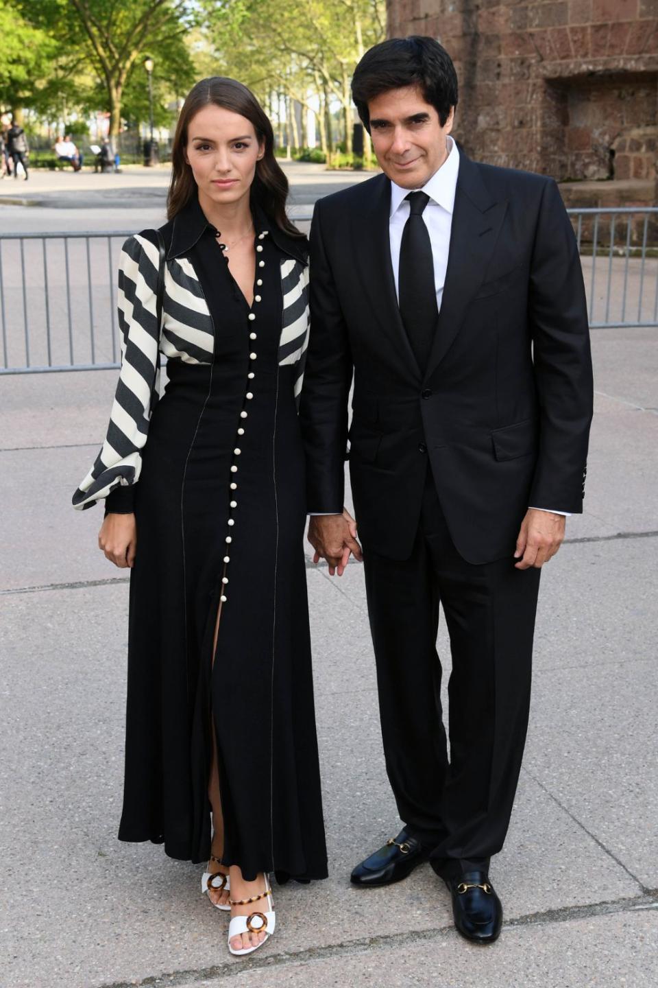 Chloe Gosselin and David Copperfield at the Statue of Liberty Museum opening ceremony, May 15. - Credit: Shutterstock