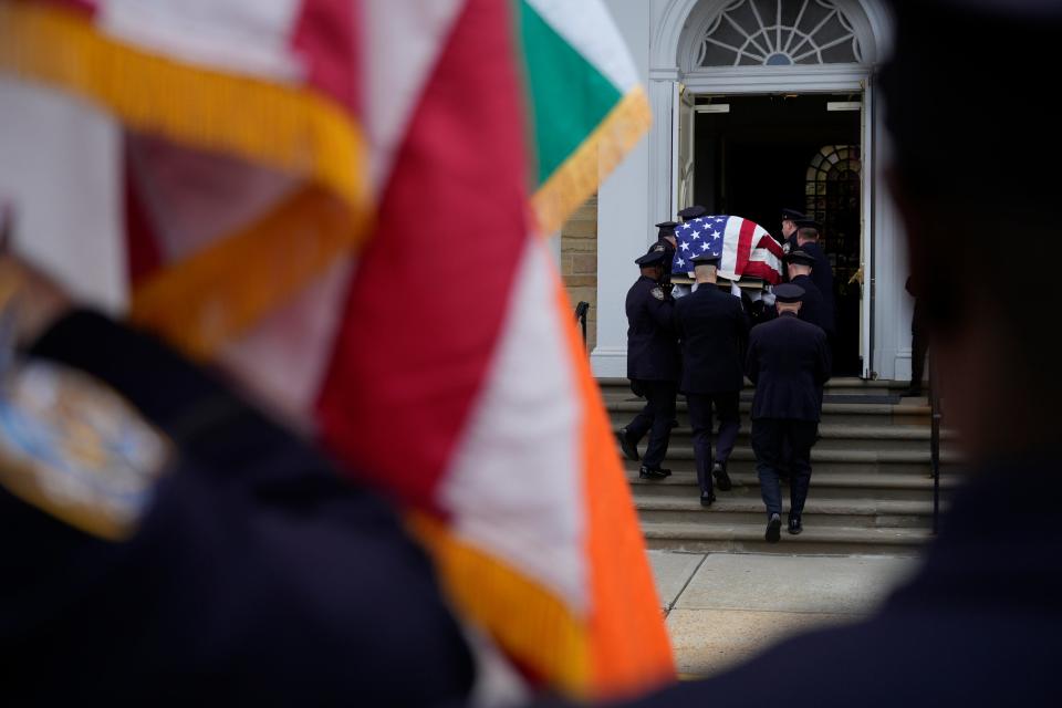 Members of the NYPD carry the flag draped casket of for former North Arlington Police Chief Joseph Zadroga at the Queen of Peace Church in North Arlington, NJ on Tuesday Jan. 30, 2024.