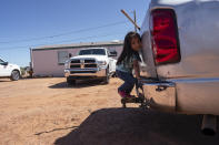 In this April 22, 2020, photo, a little girl plays in her family compound in Tuba City, Ariz. Even before the pandemic, people living in rural communities and on reservations were among the toughest groups to count in the 2020 census. (AP Photo/Carolyn Kaster)