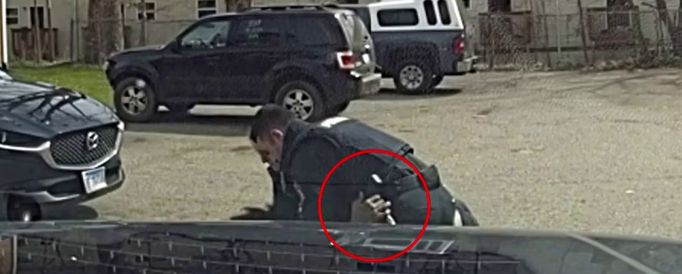 Lansing police release video of officer-involved shooting. (Still: Lansing Police Dept.)