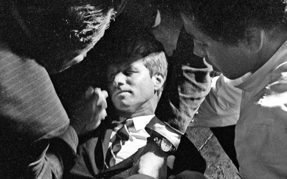 Senator Robert F. Kennedy lies mortally wounded