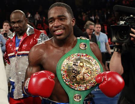 FILE PHOTO: Boxer Adrien Broner from Cincinnati, Ohio celebrates after defeating Gavin Rees from Newport, Wales during their WBC Lightweight title bout in Atlantic City, New Jersey, in this file photo taken February 17, 2013. REUTERS/Tim Shaffer/Files Picture Supplied by Action Images