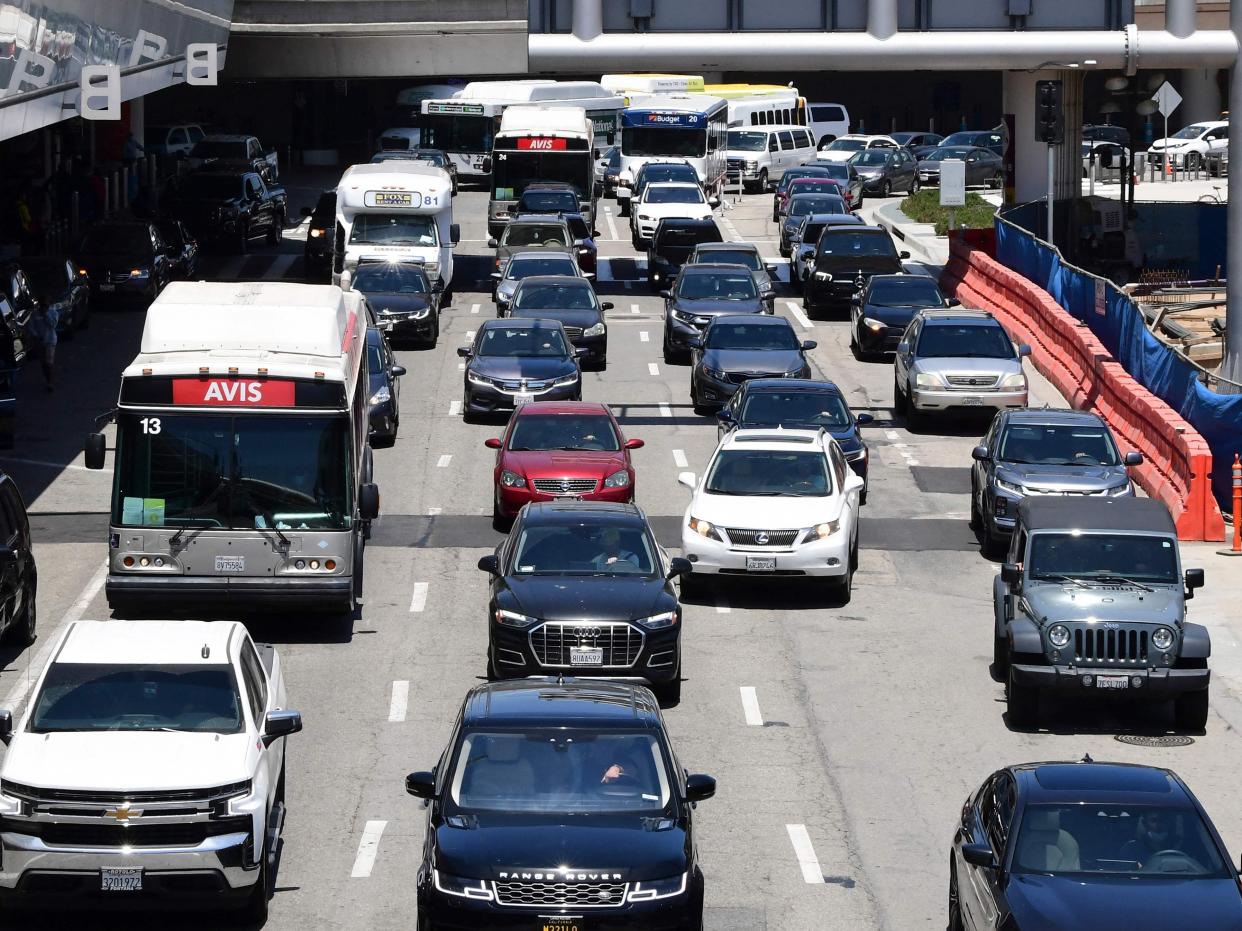 Heavy traffic is seen at Los Angeles International Airport on 27 May 2021 in Los Angeles (AFP via Getty Images)