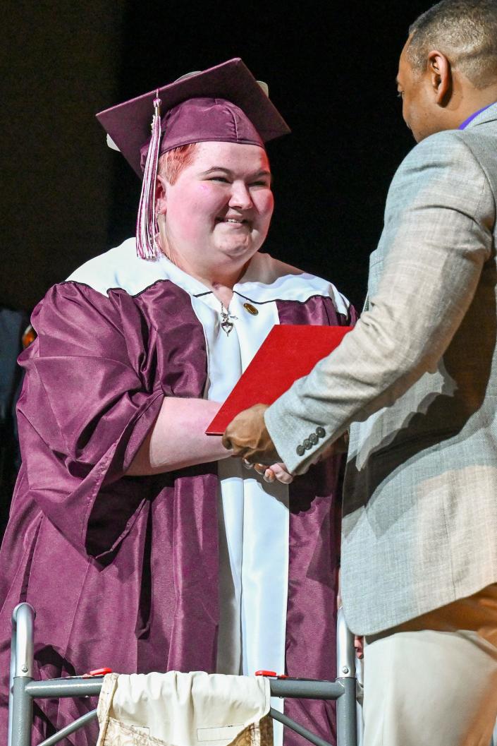 Hannah Blumka receives her diploma at the Buchanan High School graduation ceremony Friday, May 27, 2022, at Buchanan High School.