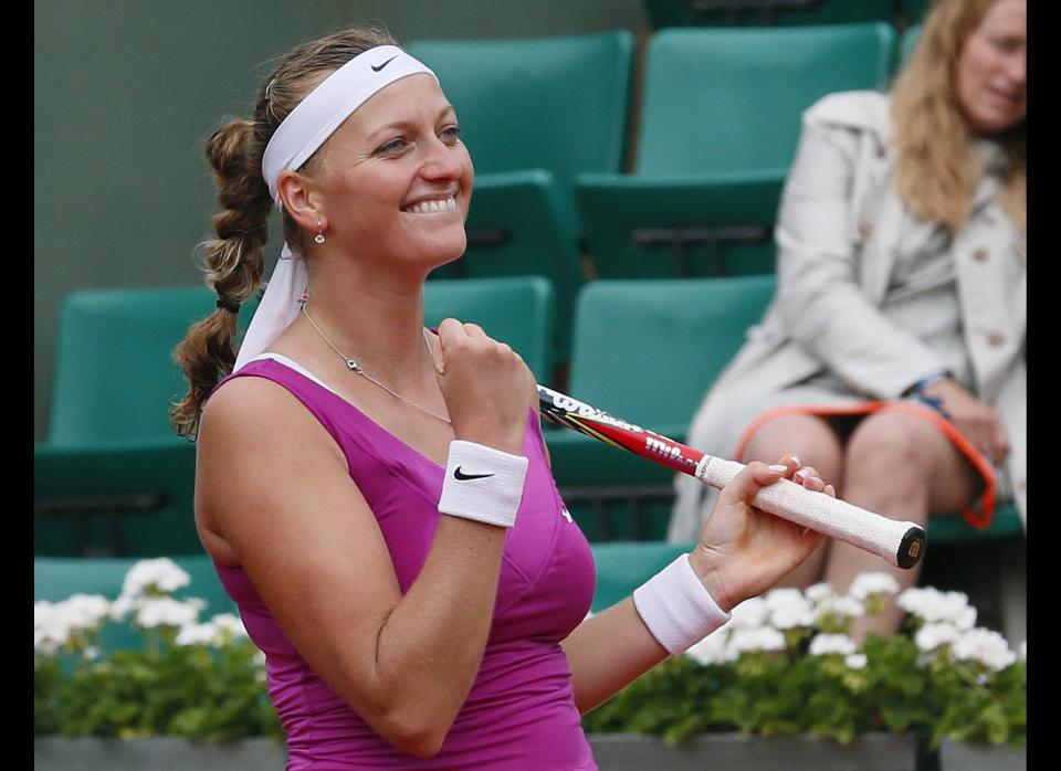 Czech Republic's Petra Kvitova celebrates after winning against Kazkhstan's Yaroslava Shvedova their women's quarterfinal tennis match of the French Open in Paris.        (Photo credit should read JACQUES DEMARTHON/AFP/GettyImages)