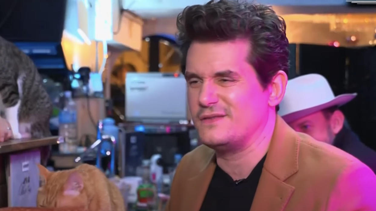  John Mayer in Tokyo cat bar on CNN. 