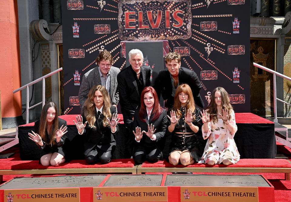 Producer Steve Binder, director Baz Luhrmann, and Austin with the Presley family: Harper Lockwood, Lisa Marie Presley, Priscilla Presley, Riley Keough, and Finley Lockwood at TCL Chinese Theatre last year. Photo: Getty