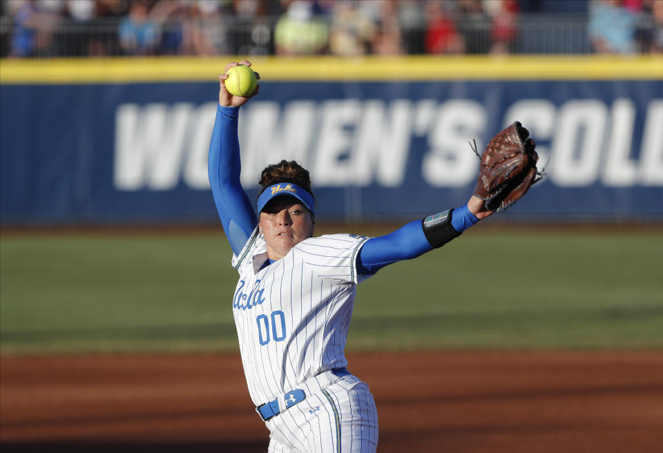 UCLA's Rachel Garcia pitches against Oklahoma during the first inning of Game 2 of the best-of-three championship series in the NCAA softball Women's College World Series in Oklahoma City, Tuesday, June 4, 2019. (AP Photo/Alonzo Adams)