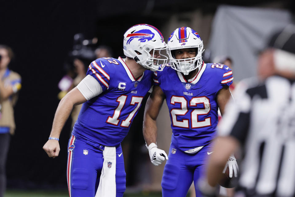 Buffalo Bills running back Matt Breida (22) celebrates his touchdown with quarterback Josh Allen (17) in the second half of an NFL football game against the New Orleans Saints in New Orleans, Thursday, Nov. 25, 2021. The Bills won 31-6. (AP Photo/Butch Dill)