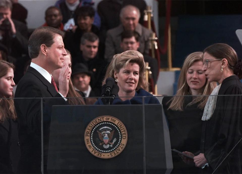 Vice President Al Gore, with his wife, Tipper Gore, is sworn in by Associate Justice Ruth Bader Ginsburg. (Photo: Ron Edmonds/AP)