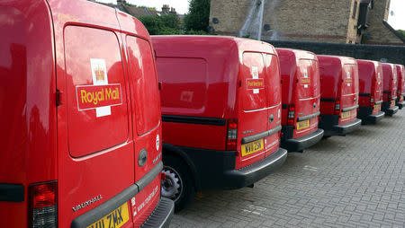 FILE PHOTO: Royal Mail vans are parked in the Leytonstone post office depot in London, Britain early July 6, 2017. REUTERS/Russell Boyce/File Photo