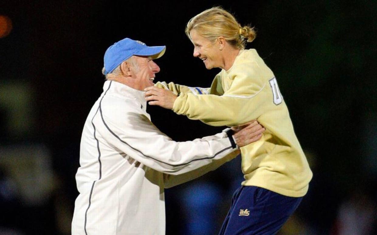 Football-loving father and daughter, John and Jill Ellis celebrate at UCLA