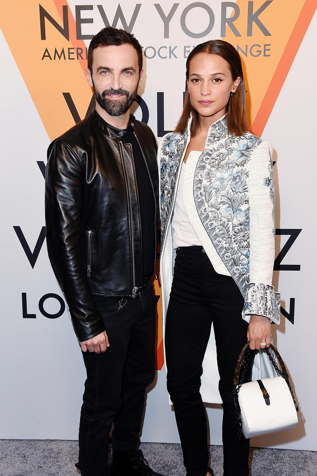 Nicolas Ghesquière and Alicia Vikander attend the Volez, Voguez, Voyagez – Louis Vuitton Exhibition Opening on October 26, 2017 in New York City. (Photo: Getty Images)