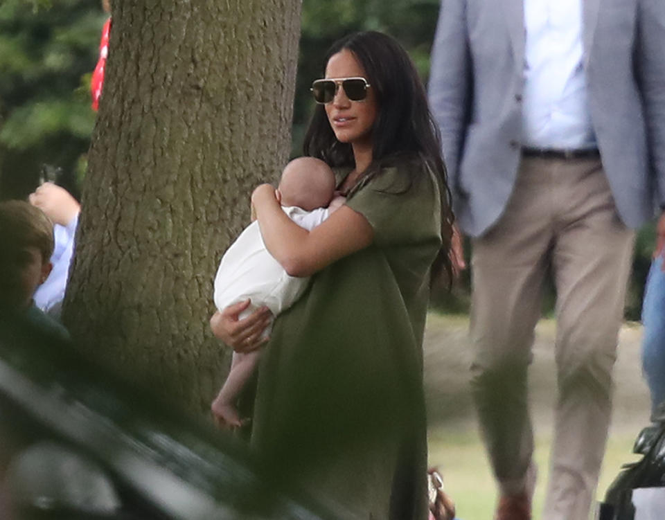 The Duchess of Sussex holding her son Archie as they attend the King Power Royal Charity Polo Day at Billingbear Polo Club, Wokingham, Berkshire.