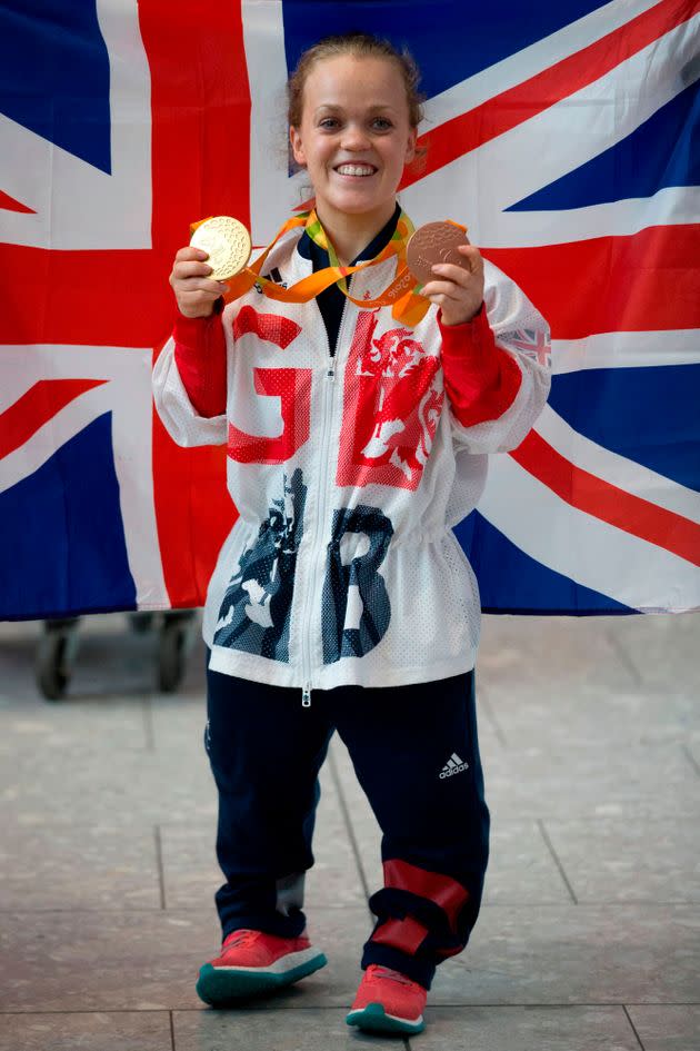 Ellie posing with her gold medals after her wins in Rio back in 2016 (Photo: JUSTIN TALLIS via Getty Images)