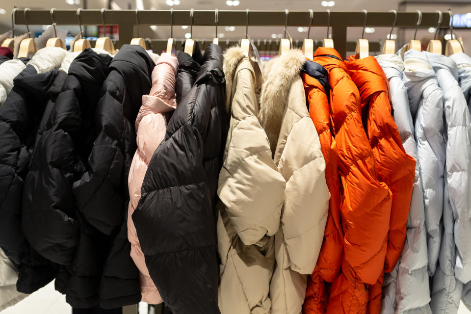 Winter Coats Hanging For Sale On Rack In Store