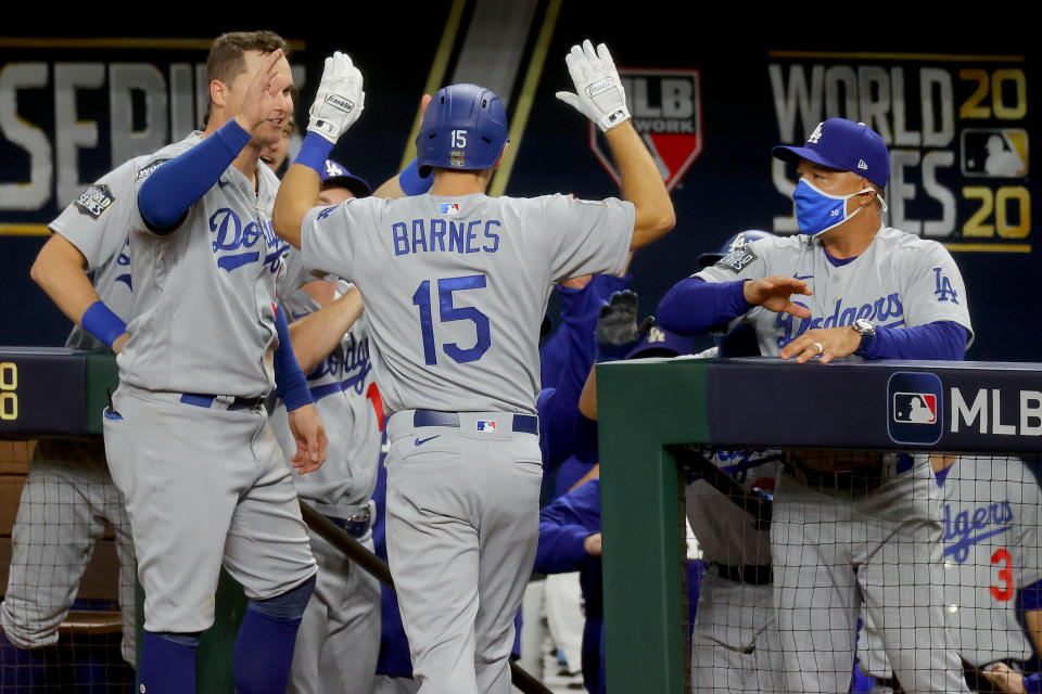 Austin Barnes made history in the Dodgers win in World Series Game 3. (Photo by Ronald Martinez/Getty Images)