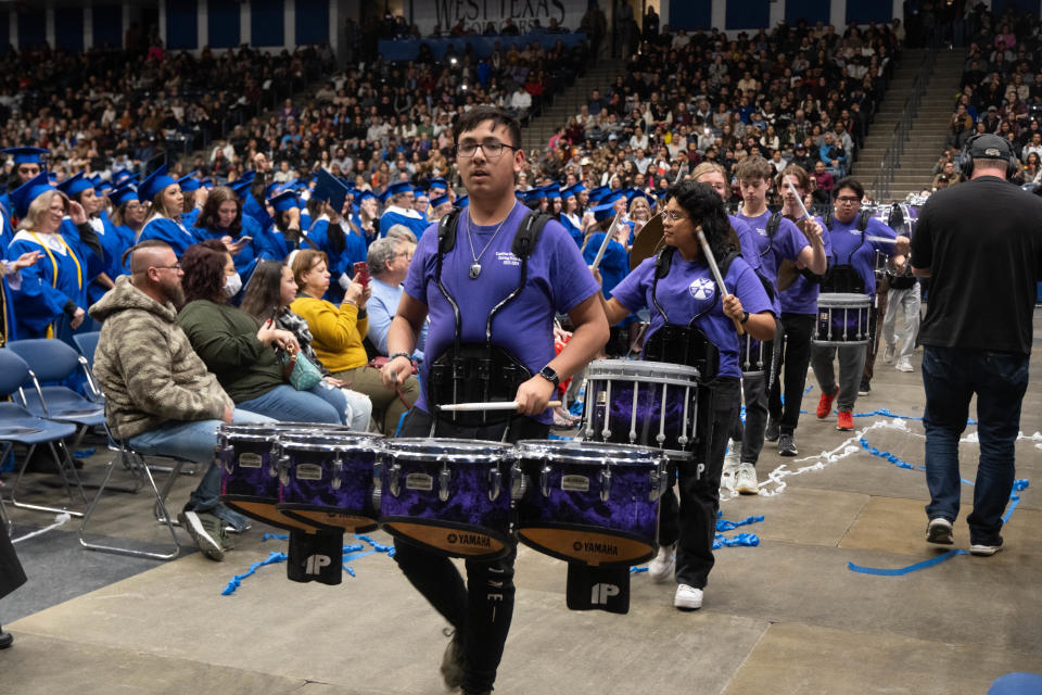 The Canyon High School Drum Line plays to honor graduates Friday evening at the Amarillo College Commencement Ceremony at the Amarillo Civic Center.