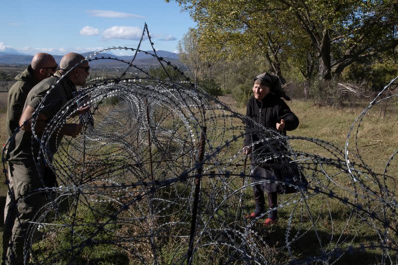 The Wider Image: Bordering Georgia's breakaway regions, villagers fear Russia's next steps