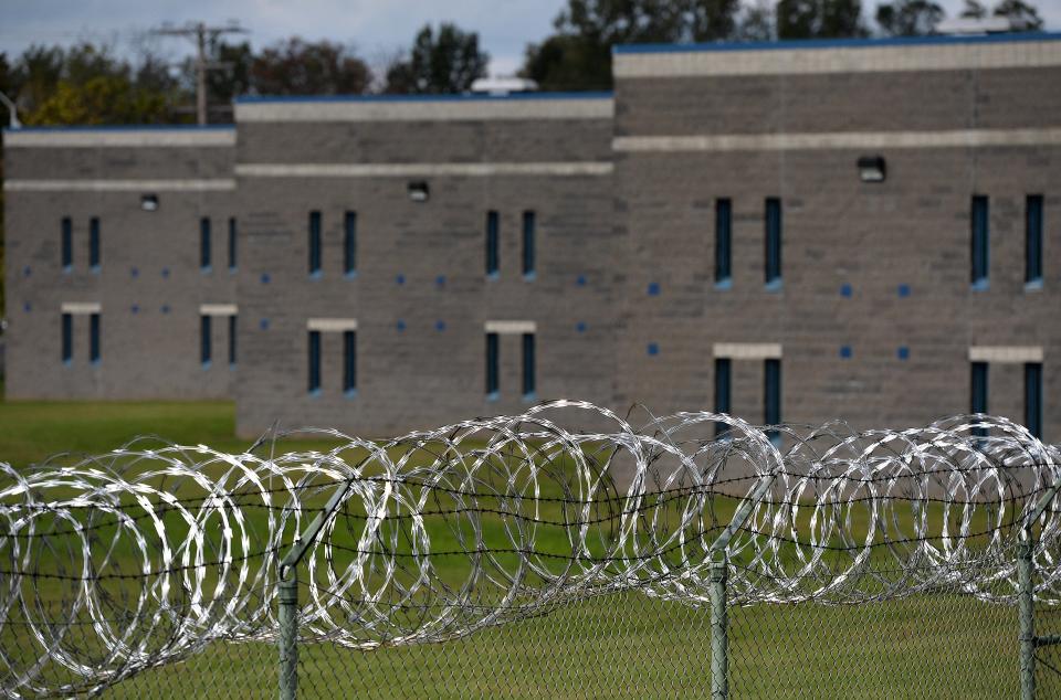 Razor wire surrounds the perimeter of the Erie County Prison, shown here on Oct. 23, 2020.