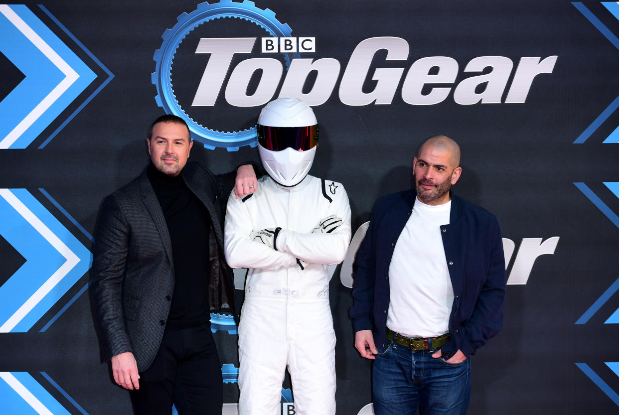 Paddy McGuinness (left), The Stig (centre) and Chris Harris attending the Top Gear Season 28 Premiere held at Odeon Leicester Square, London.