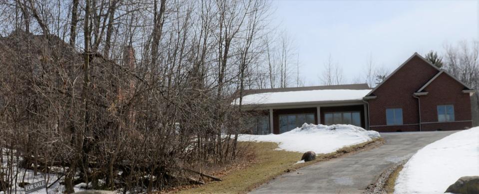 The studio house owned by former Green Bay Packers running back Ahman Green at 1420 Limestone Trail is for sale.