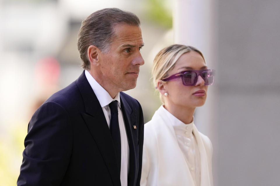 Hunter Biden, left, arrives to federal court with his wife, Melissa Cohen Biden, Friday, June 7, 2024, in Wilmington, Del. (AP Photo/Matt Slocum)