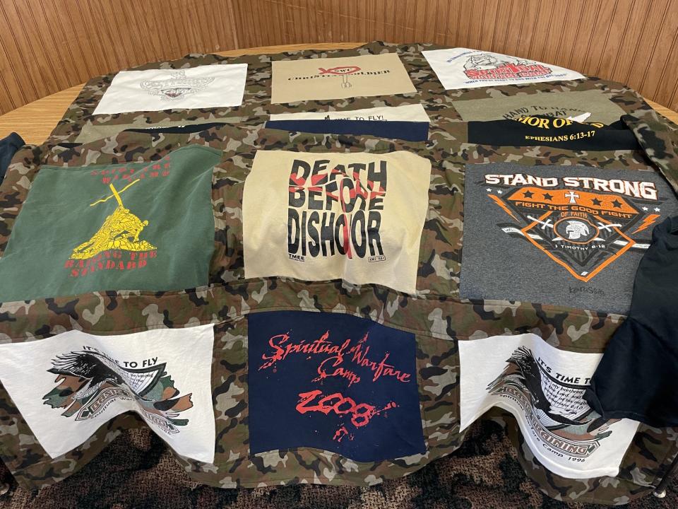 Memorabilia from Pastor Louie's ministry was displayed at the reception. This quilt was made with shirts from past Spiritual Warfare Camps.
