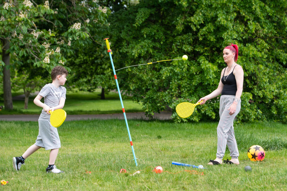 <p>People play swingball in the sun in Greenwich Park, London, as the UK has recorded its third successive warmest day of the year with temperatures reaching 26.6C in parts of the country. Picture date: Wednesday June 2, 2021.</p>
