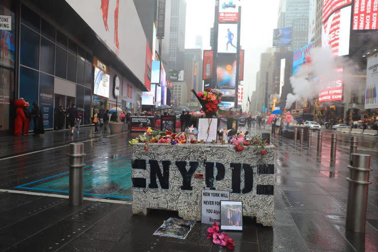The impromptu memorial in Times Square