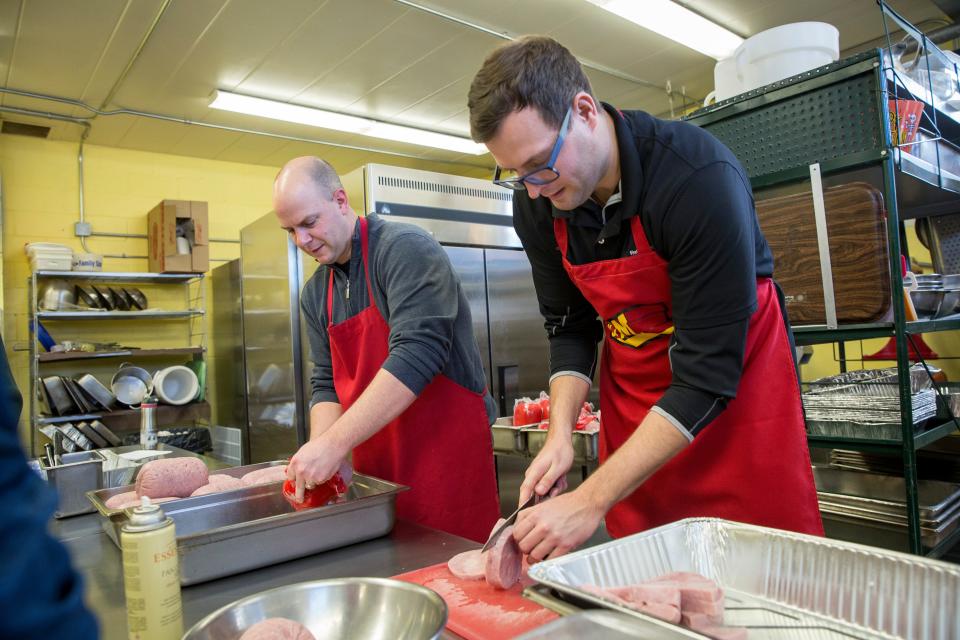 Volunteers work in an assembly line to get preparation work done for the Soup Kitchen of Muncie's Christmas Breakfast in 2019. This Thursday the Soup Kitchen will be home to The Second Annual Thanksgiving Feast with Concrete Rose and Charmed Cupcake from 11 a.m. until 2 p.m. serving the community.