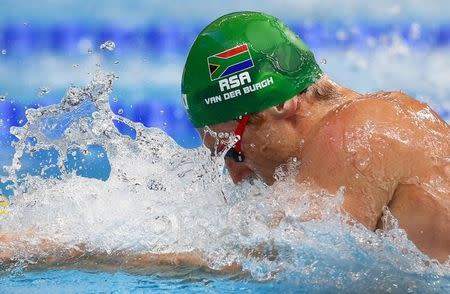 Cameron van der Burgh of South Africa swims to set a new world record in the men's 50m breaststroke preliminaries at the Aquatics World Championships in Kazan, Russia, August 4, 2015. REUTERS/Hannibal Hanschke