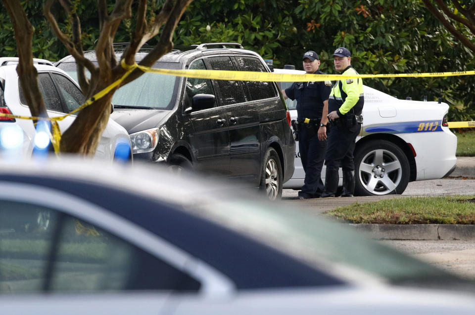 Law enforcement officials work outside a municipal building that was the scene of a shooting, June 1, 2019, in Virginia Beach, Va. A longtime city employee opened fire at the building Friday before police shot and killed him, authorities said. (Photo: Patrick Semansky/AP)