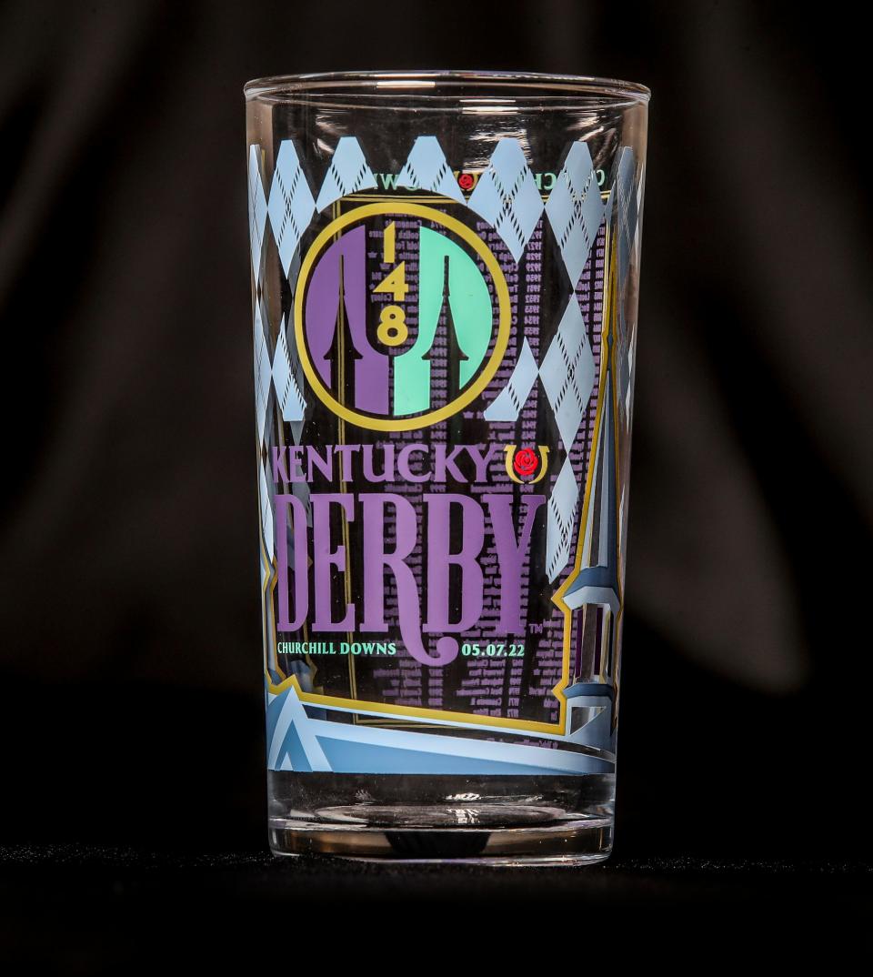 Kentucky Derby glass from Derby 148 from 2022.  The winner from the previous year is usually listed at the bottom but is left blank on this glass because Medina Spirit was stripped of the victory.
