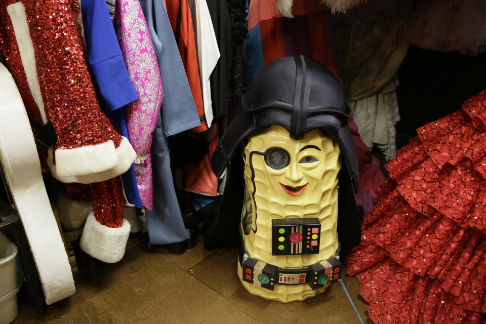 In this Tuesday, Nov. 19, 2019 photo, a costume hat depicting Mr. Peanut sits in the backstage dressing room of the musical "Beach Blanket Babylon" in San Francisco. The final performance of the small campy San Francisco show is set for New Year's Eve. (AP Photo/Eric Risberg)