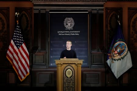 Facebook Chairman and CEO Mark Zuckerberg addresses the audience in Georgetown University's Institute of Politics and Public Service in Washington