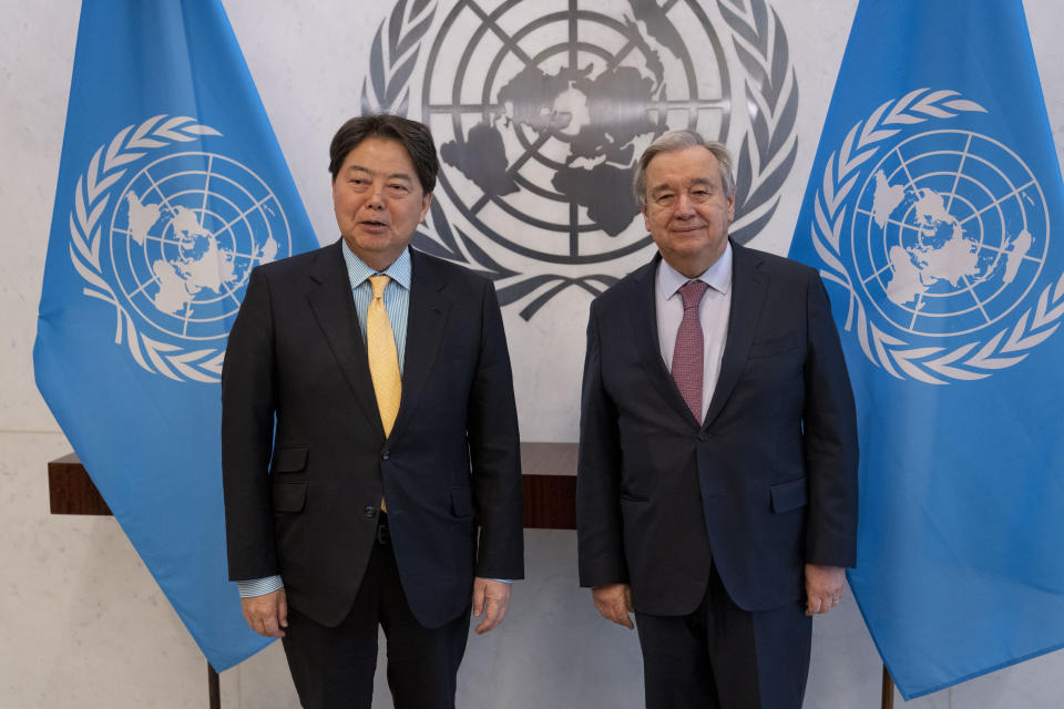 Hayashi Yoshimasa, Minister for Foreign Affairs of Japan, left, meets with United Nations Secretary General Antonio Guterres at United Nations headquarters, Thursday, Jan. 12, 2023. (AP Photo/John Minchillo)