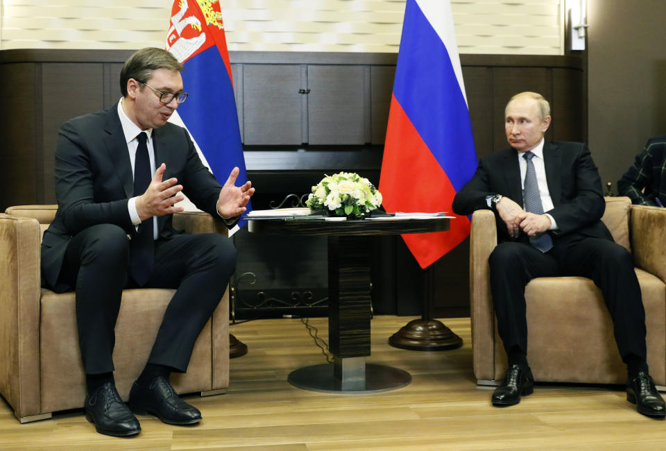 Russian President Vladimir Putin, right, listens to Serbian President Aleksandar Vucic during their meeting at the Bocharov Ruchei residence in the Black Sea resort of in Sochi, Russia, Wednesday, Dec. 4, 2019. (Shamil Zhumatov, Pool Photo via AP)