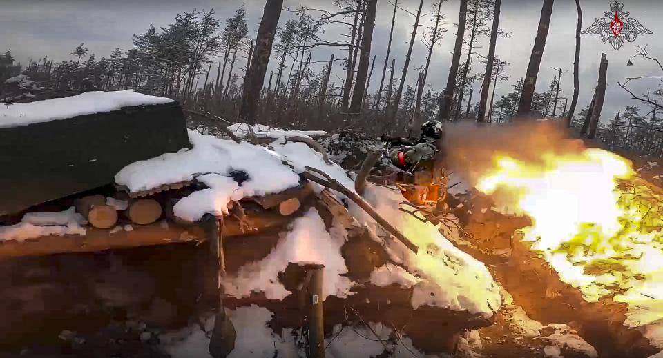 In this handout photo taken from video released by Russian Defense Ministry Press Service on Wednesday, Feb. 15, 2023, A Russian paratrooper fires a Russian man-portable missile on a mission at an unspecified location in Ukraine. (Russian Defense Ministry Press Service via AP)