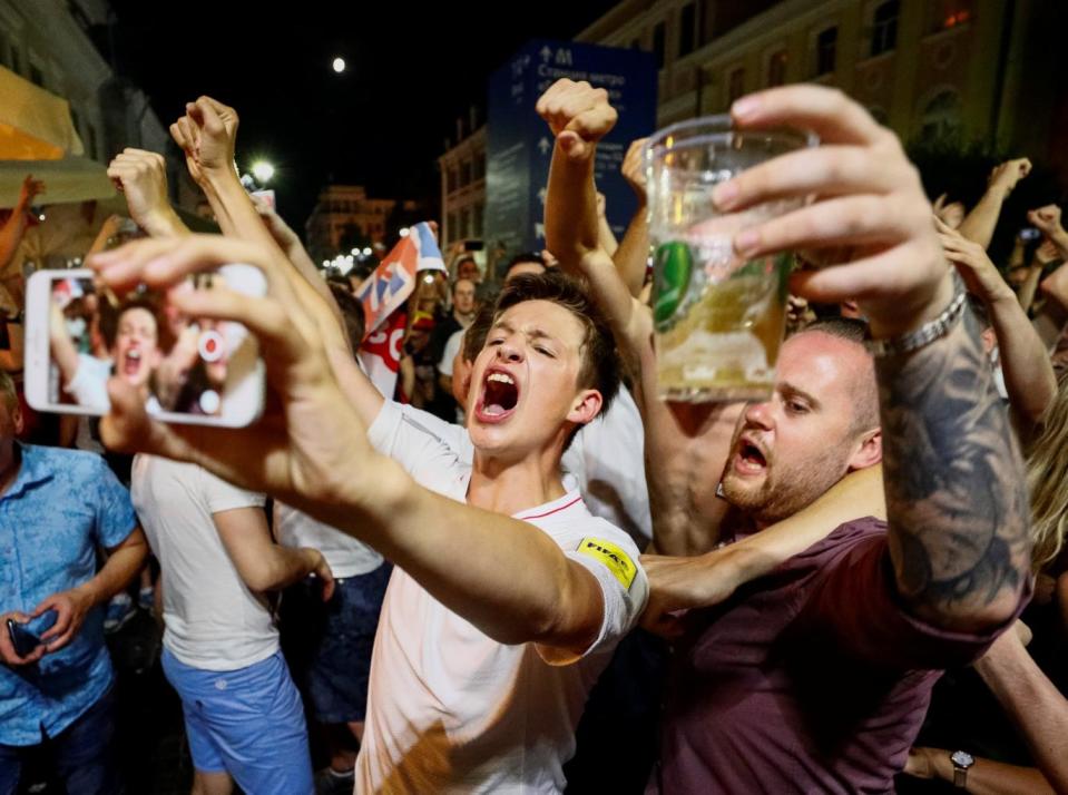 England fans celebrate on the streets on Nizhny Novgorod (REUTERS)