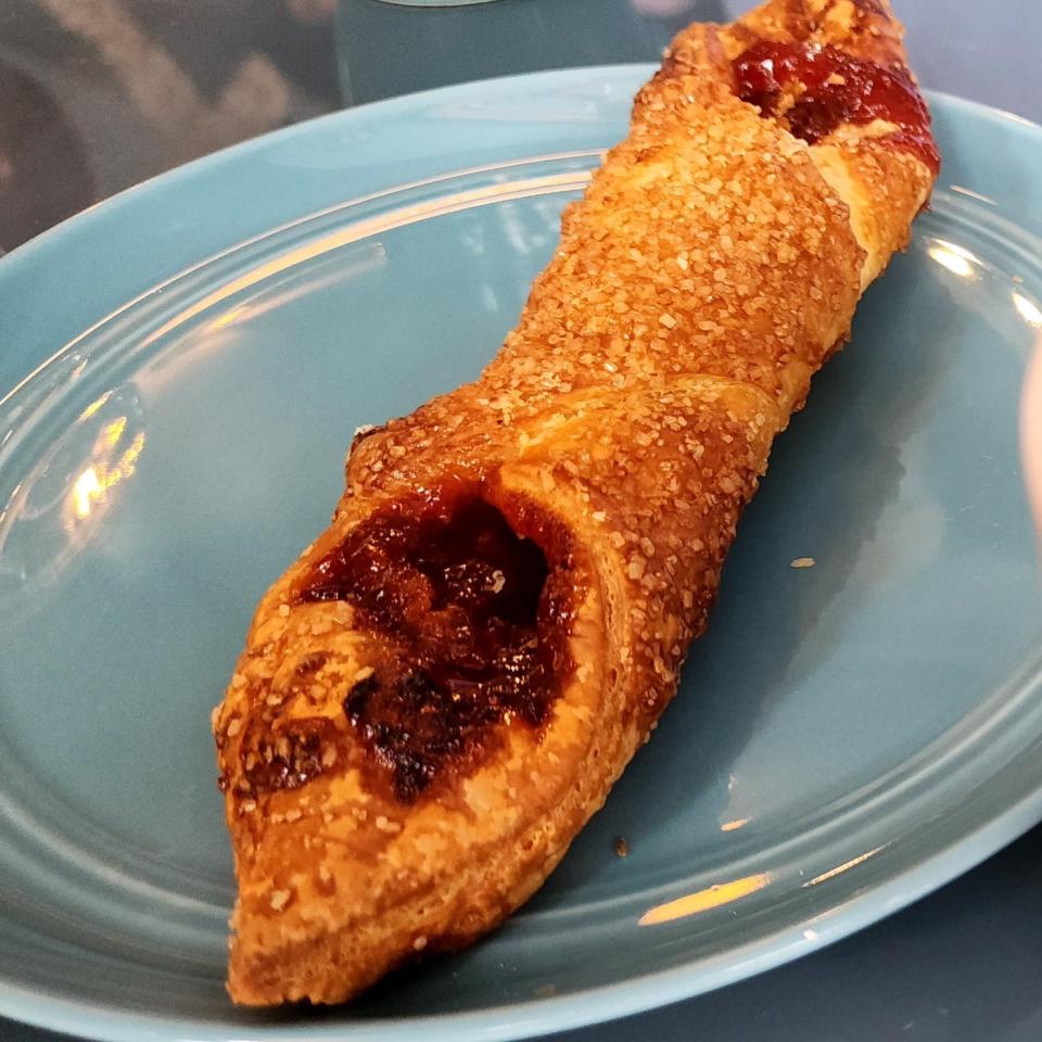 A sweet Puerto Rican treat at brunch, quesitos are made with sweetened cream cheese folded into puff pastry. This one is filed with sweet guava (a tropical fruit).