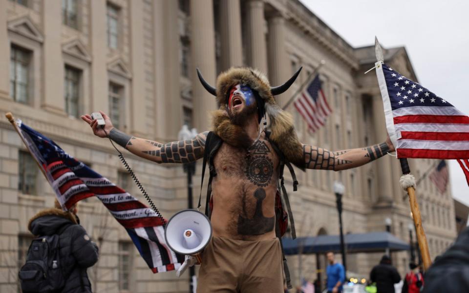 Chansley using his megaphone during the protest, January 6 2021