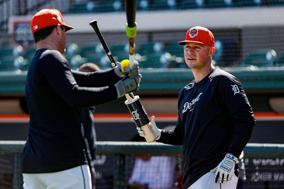 Detroit Tigers first baseman Spencer Torkelson talks to infielder Colt Keith during spring training at Joker Marchant Stadium in Lakeland, Florida, on Thursday, Feb. 22, 2024.