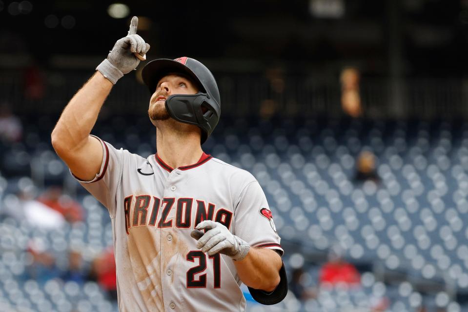 Apr 21, 2022; Washington, District of Columbia, USA; Arizona Diamondbacks designated hitter Cooper Hummel (21) celebrates while crossing home plate after hitting a two-run home run against the Washington Nationals in the fifth inning at Nationals Park.